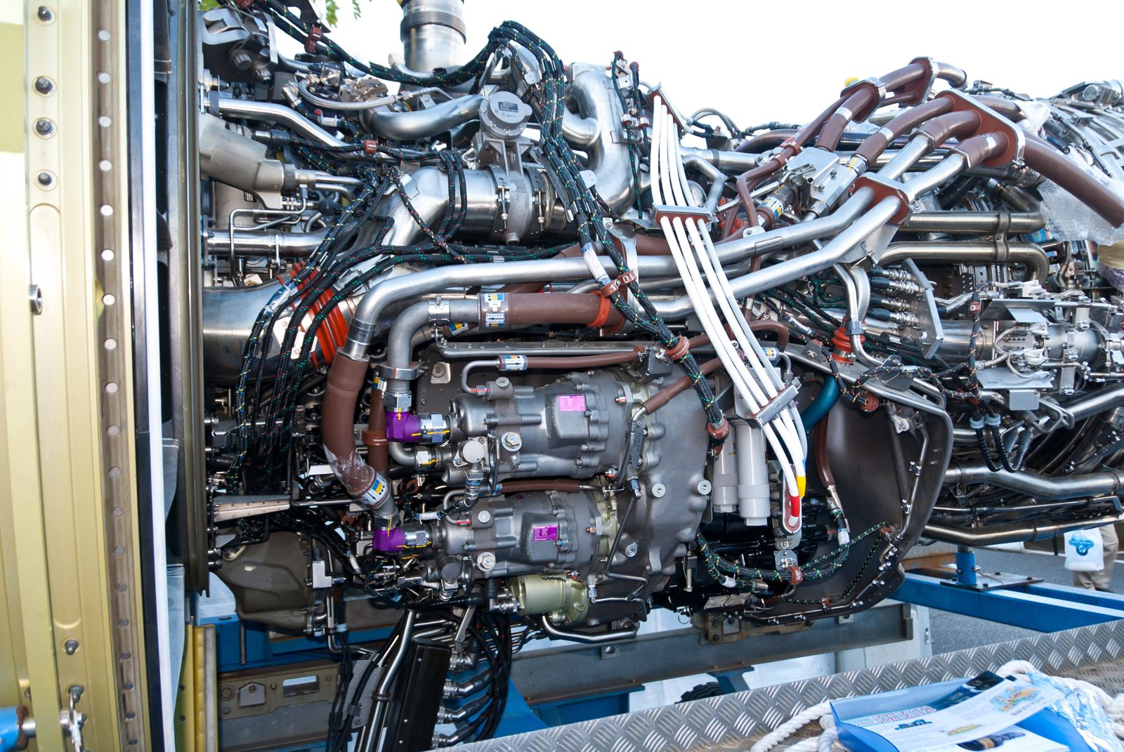 The core of a turbofan engine on a stand, with its accessories and harnesses